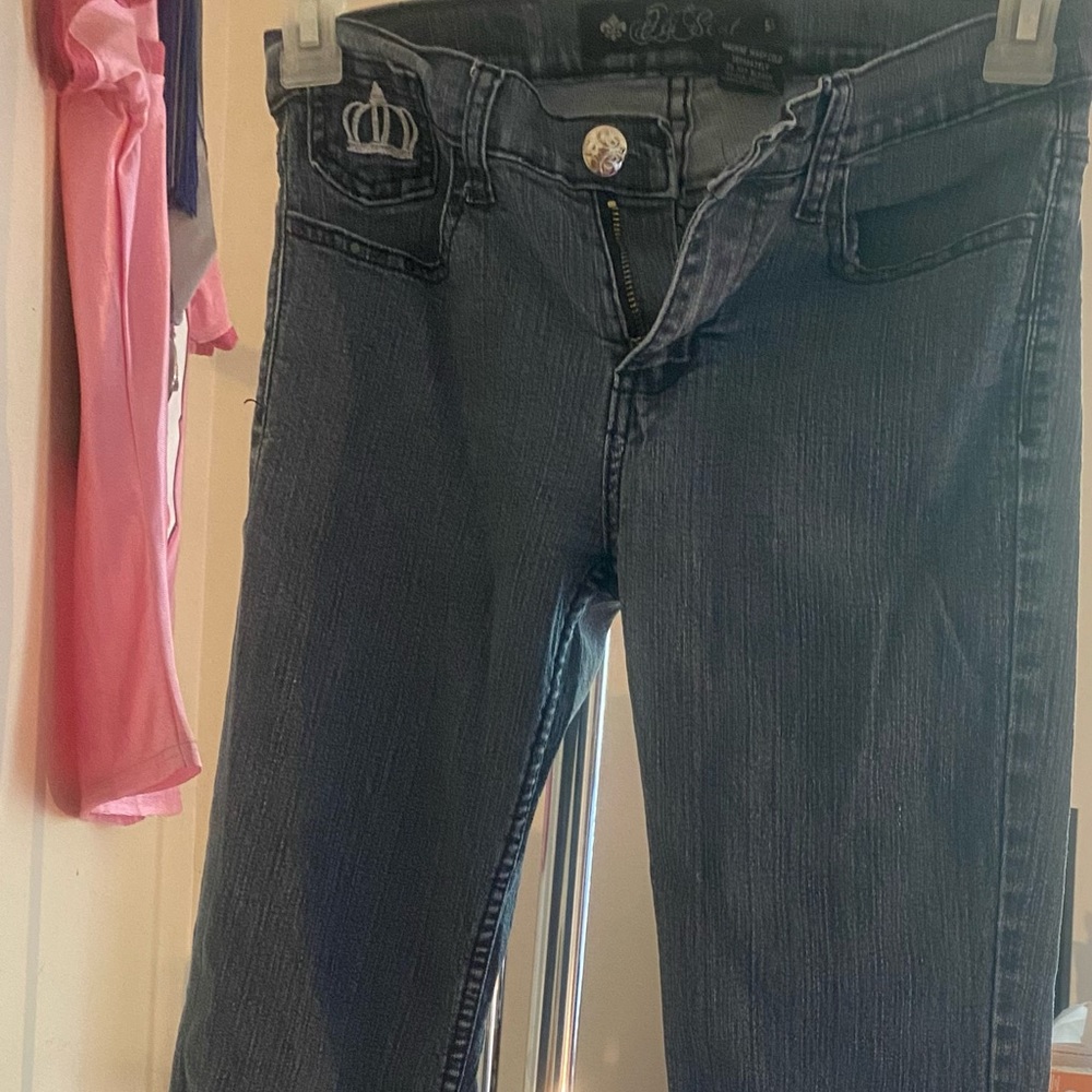 Black Jeans with silver and purple on the back pockets